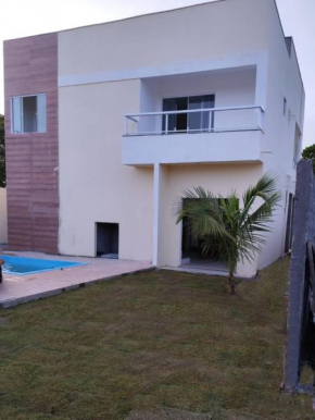 Casa com piscina em Guarajuba 4quartos